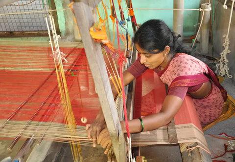 Weaver at work on a saree loom